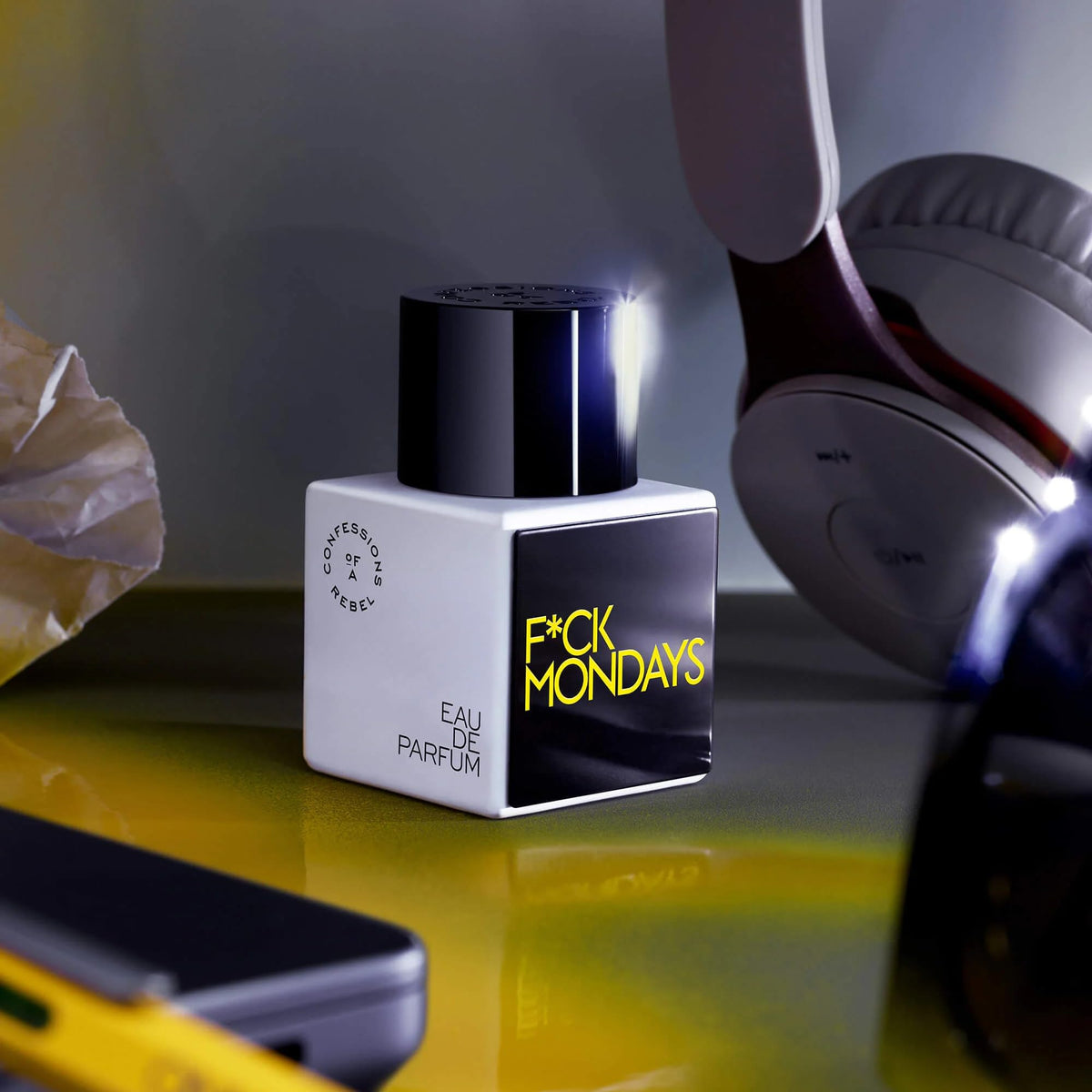 Cap close-up on Confessions of a Rebel Fck Mondays EDP, showcasing premium packaging.