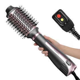 CONFU Blow Dryer Brush with oval barrel for smooth volume and a polished finish.