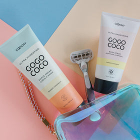 Coochy Ultra Hydrating Shaving Cream Tea Tree oil drop emphasizes protection and freshness.