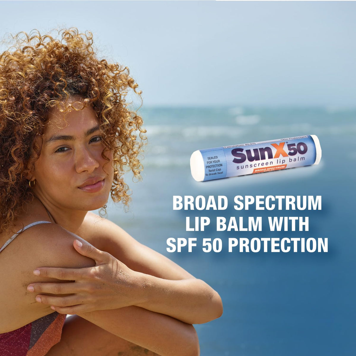 CoreTex Sun X 50 lip balm tube on lip for easy outdoor wear