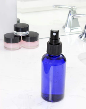 Cornucopia Brands 4oz blue bottle fine mist sprayer for easy application.