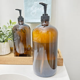 Close-up of amber glass bottle pump top preserves ingredients and maintains consistency.