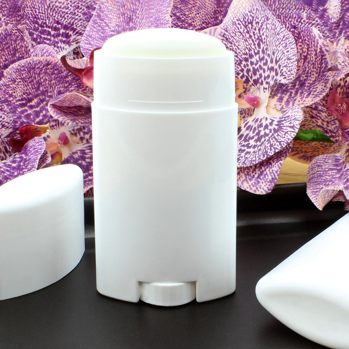 Cornucopia Brands BPA-free white twist-up tubes for safe, refillable deodorant.