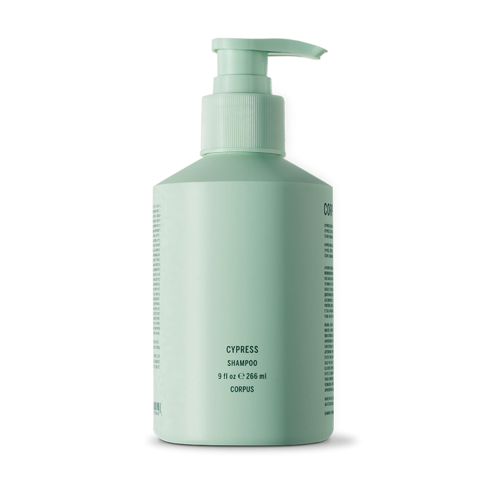 Corpus Cypress Shampoo bottle front view highlighting a plant-based cleanse for all hair types.