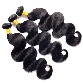 Coshgirl body wave bundles 10 inch laid out to reveal natural shine and voluminous look.