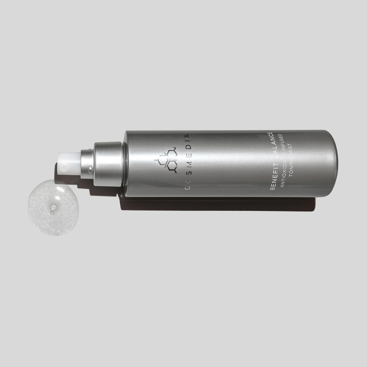 Flat lay of COSMEDIX Benefit Balance Toner with skincare essentials