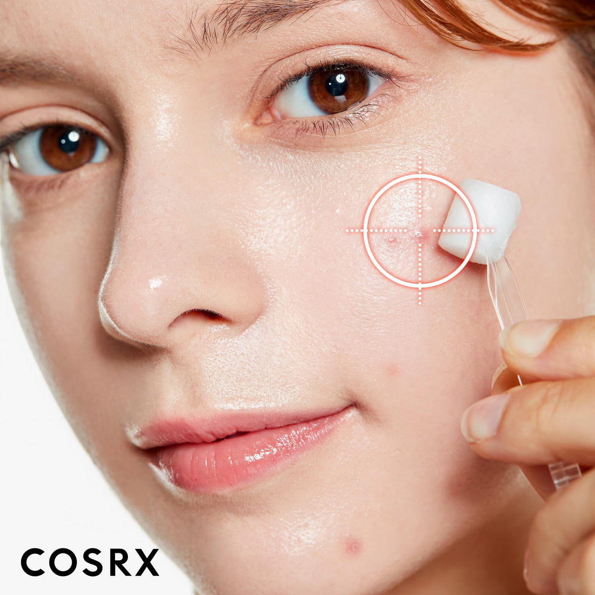 COSRX bottle with cotton balls on counter for routine use.