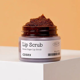COSRX Lip Care Balm texture during application demonstrating creamy exfoliation