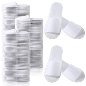 Coume disposable slippers open-toe white for guest comfort in hotels and homes.