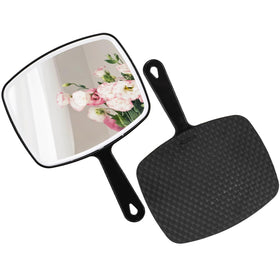 Covzoe hand mirror in use during makeup routine at the dressing table