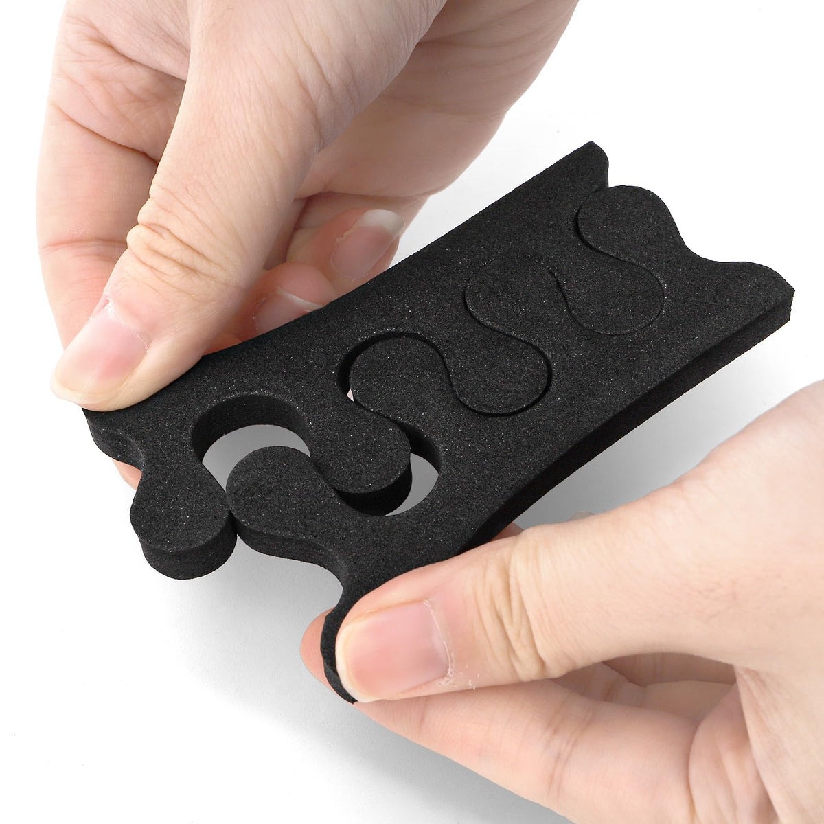Covzoe toe separators in use demonstrates precise nail polish separation.