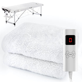 Crablux massage table heating pad on bed delivers cozy warmth for sessions.