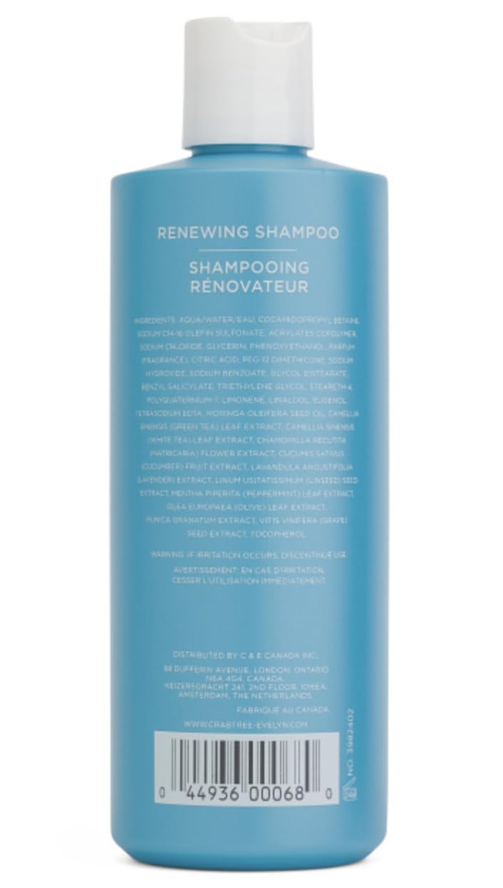 Crabtree & Evelyn La Source Renewing Shampoo label closeup, highlighting botanicals for hair vitality