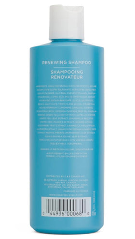 Crabtree & Evelyn La Source Renewing Shampoo label closeup, highlighting botanicals for hair vitality