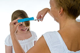 CreaClip stainless steel scissors close-up highlighting durability and precision.