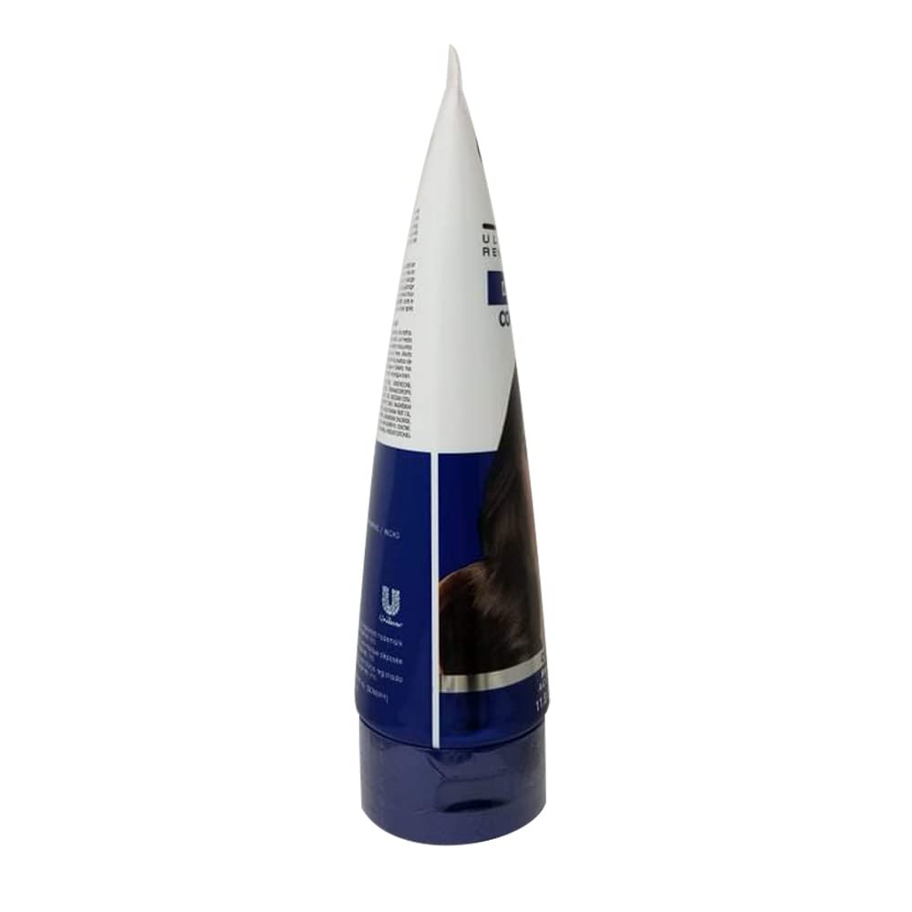 Cream Silk Damage Control bottle side view highlighting sleek design.