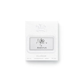 Creed Aventus spray atomizer, captured mid-pump, signaling a refined grooming ritual.