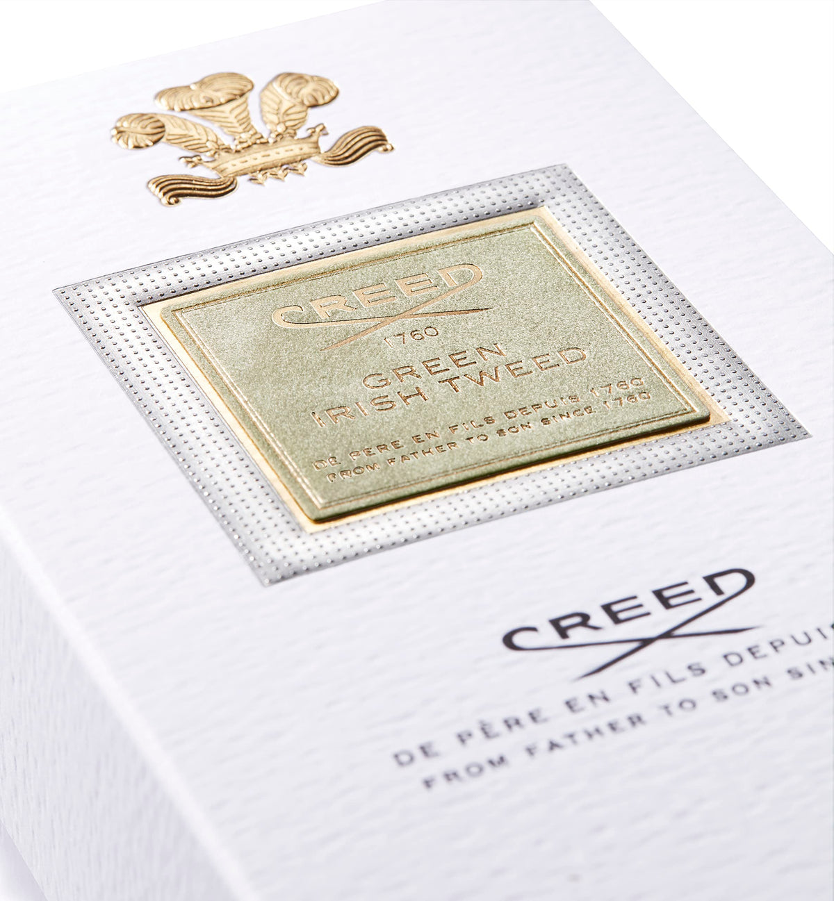 Creed Green Irish Tweed cap close-up, showcasing luxury craftsmanship.
