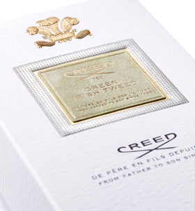 Creed Green Irish Tweed cap close-up, showcasing luxury craftsmanship.
