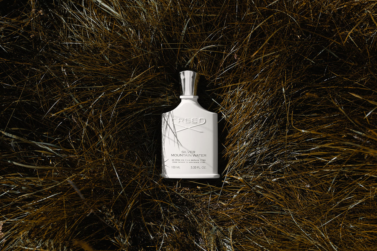 Creed Silver Mountain Water spray onto pulse points for evolving aroma.
