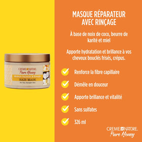 Applying Creme of Nature Hair Mask shows smooth glide for detangling.