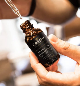 Cremo Distiller's Blend label detail highlighting premium reserve fragrance.