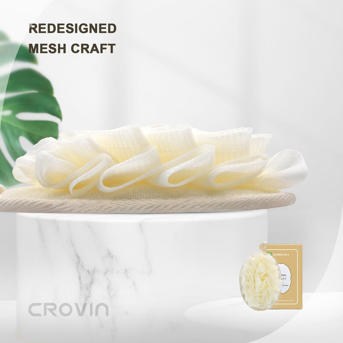 Crovin shower puff with elastic strap ensures secure grip during bath.