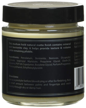 Crown Shaving Hippie Killer matte styling clay application on hands shows easy styling.