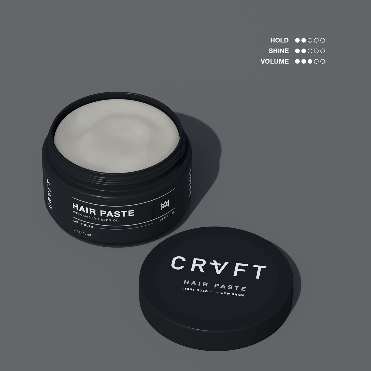 Hands applying CRVFT paste for texture-ready styling on the go.