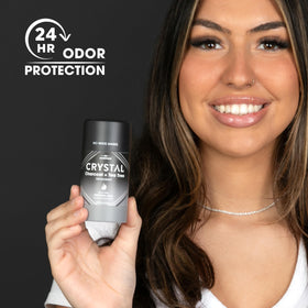 Crystal Essence magnesium solid stick being applied for aluminum-free freshness