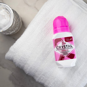 Crystal Essence roll-on cap close-up illustrating a clean, residue-free experience.