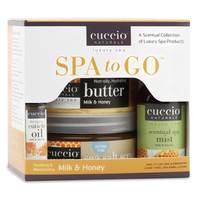Cuccio Milk and Honey Spa Mist bottle refreshing towels and room ambiance.