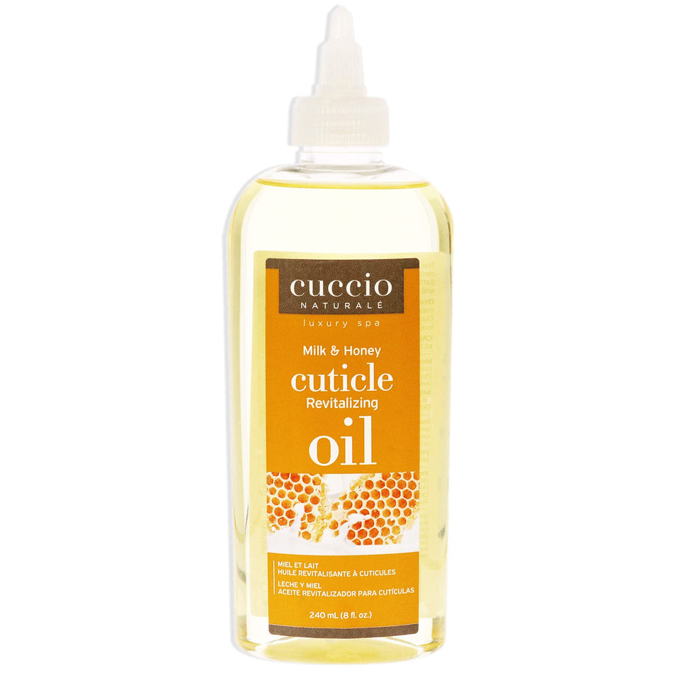 Cuccio Naturale Revitalizing Cuticle Oil bottle delivering hydrating care for dry cuticles.