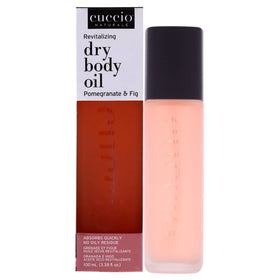 Cuccio Naturale Revitalizing Dry Body Oil bottle with pomegranate-fig scent for smooth, hydrated skin.