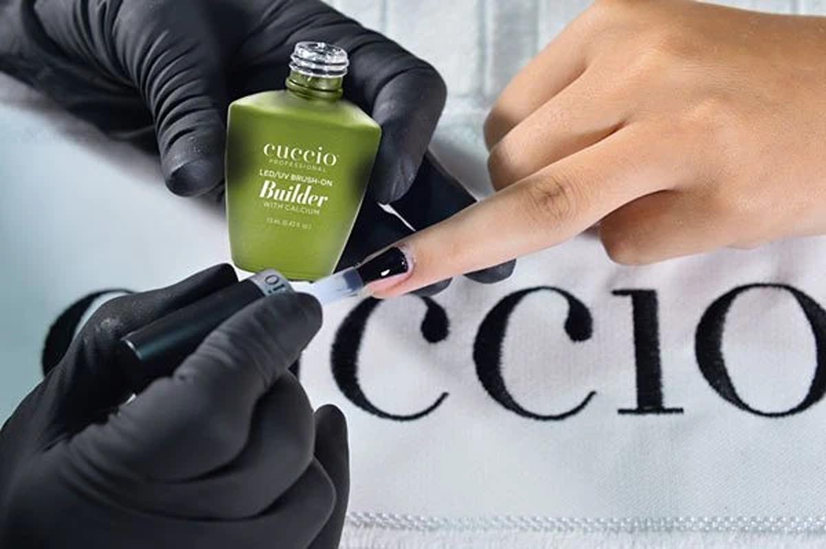 Cuccio 4 oz bottle supports durable, salon-quality manicures.