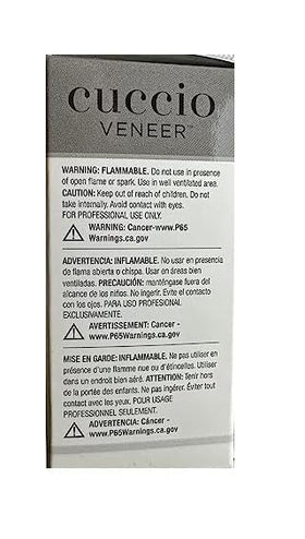 Cuccio Veneer curing under LED/UV lamp for efficient gel hardening.