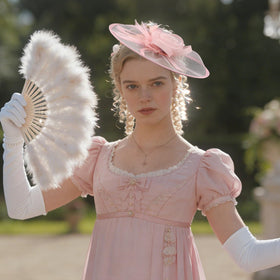CURASA pink fascinator worn on head for a show-stopping look