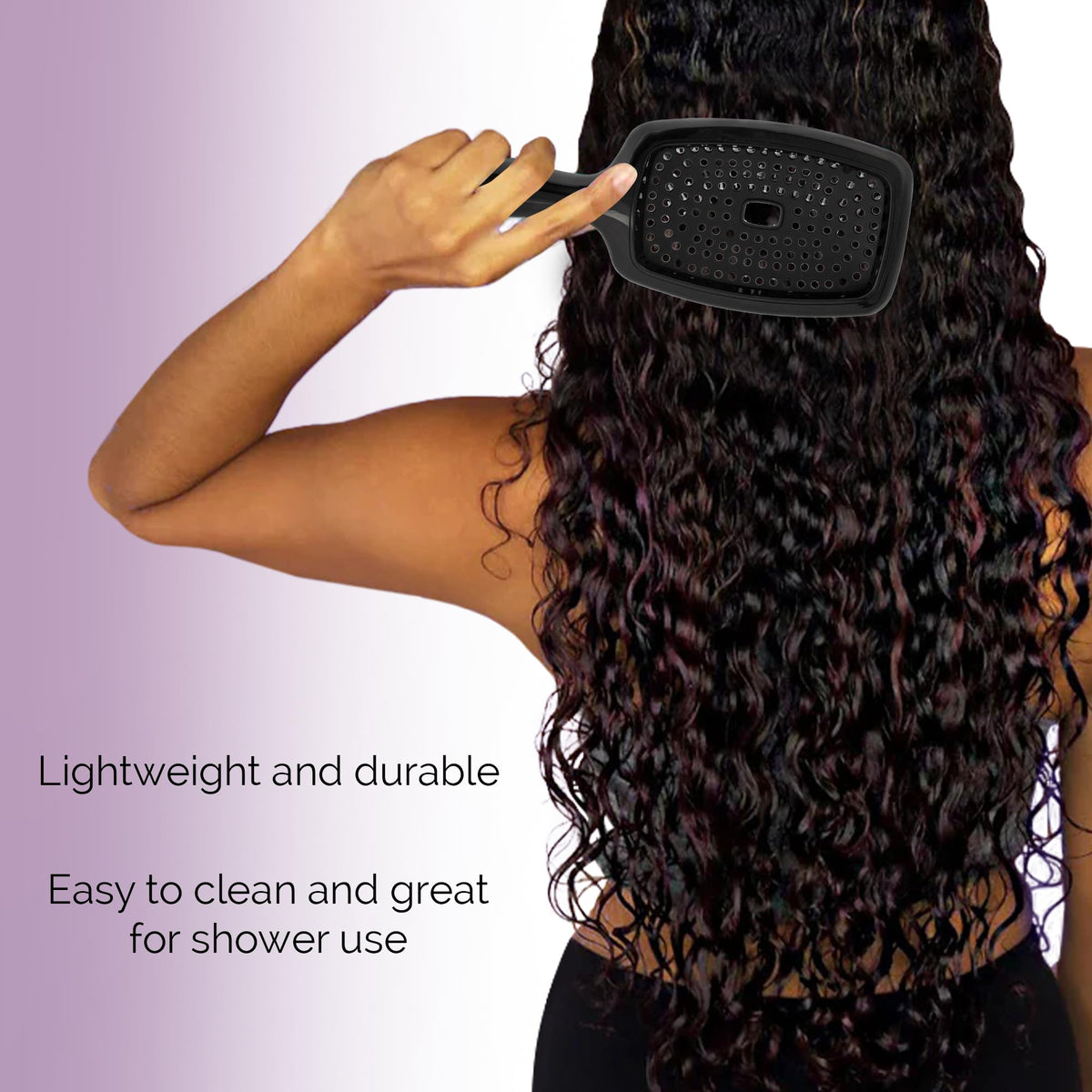 Curl Keeper Flexy Brush in purple used on wigs and extensions for detangling.
