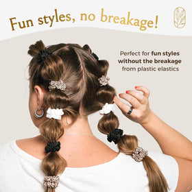 Shiny, soft silk texture from Curlfriend Collective scrunchies with durable elasticity.