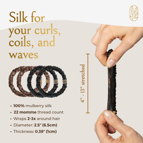 Curlfriend Mulberry Silk Skinny Scrunchies reduce frizz and breakage during daily wear.