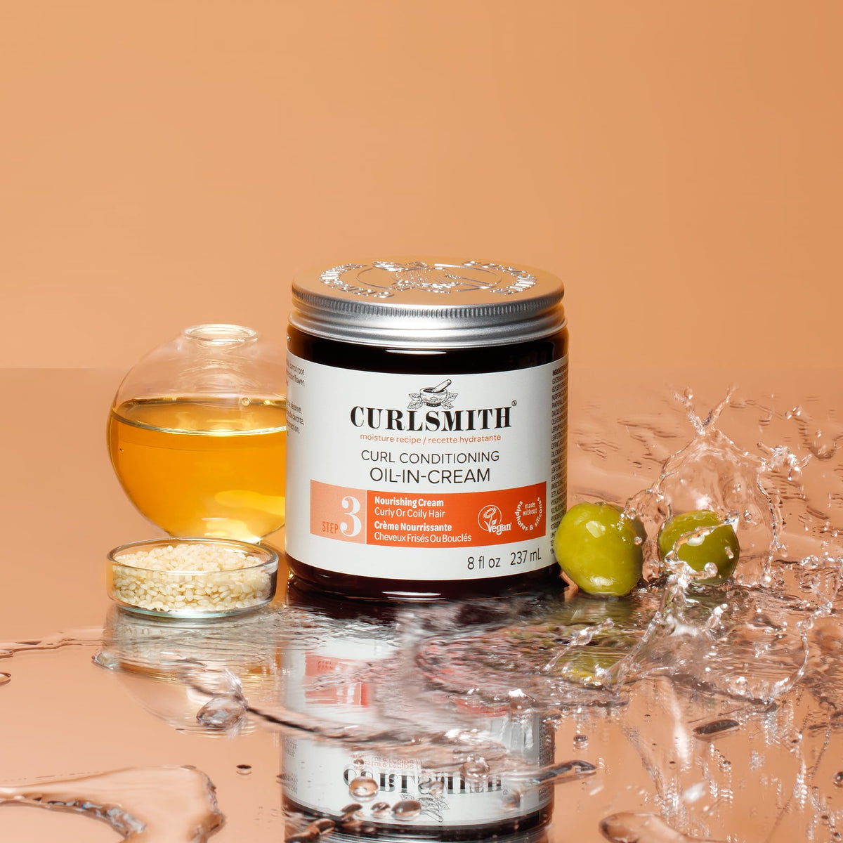 CURLSMITH Curl Conditioning Oil-in-Cream hair close-up after application.