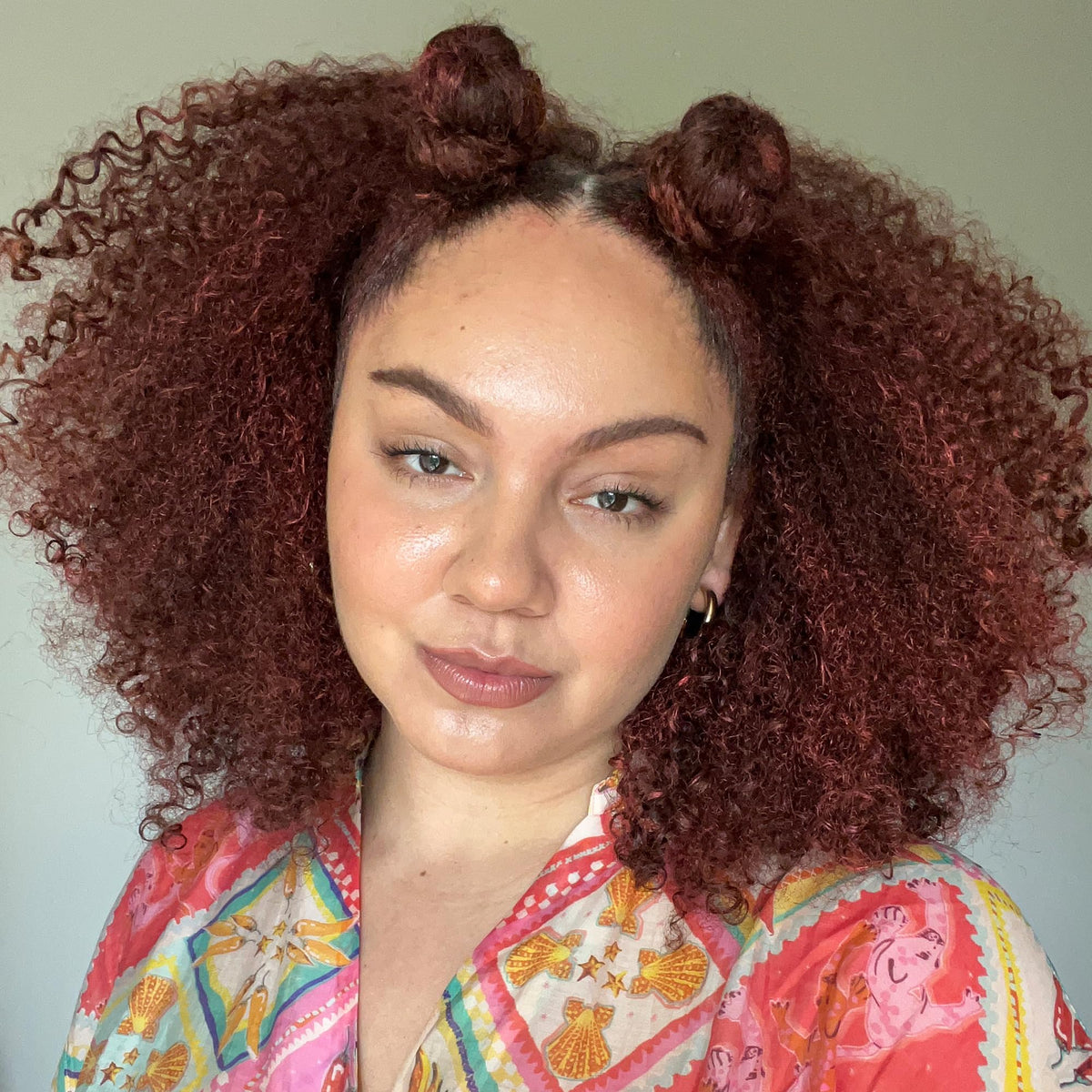Curlsmith Ruby Hair Makeup hands applying on damp hair