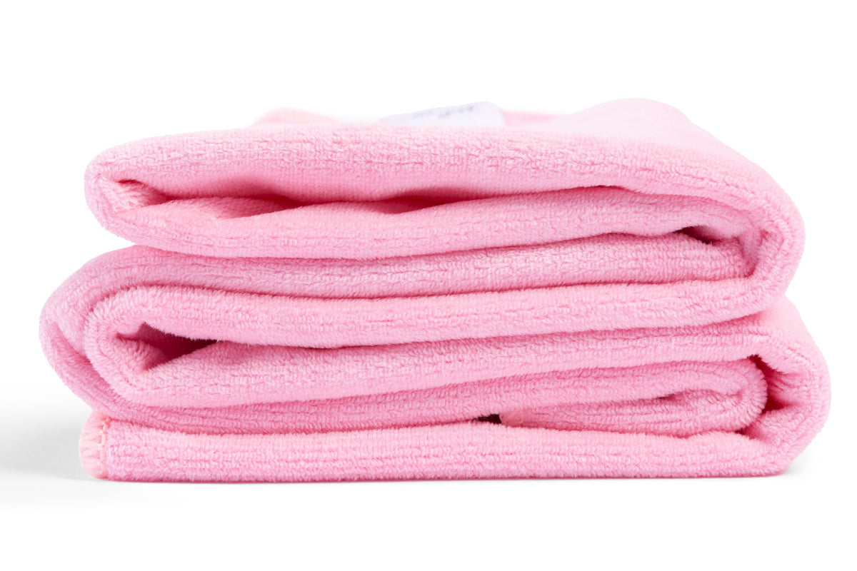 Curly Girl towel dries hair rapidly, ideal for post-shower use.