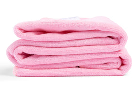 Curly Girl towel dries hair rapidly, ideal for post-shower use.