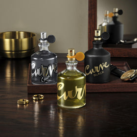 Curve for Men aftershave bottle suggests a coordinated grooming routine.