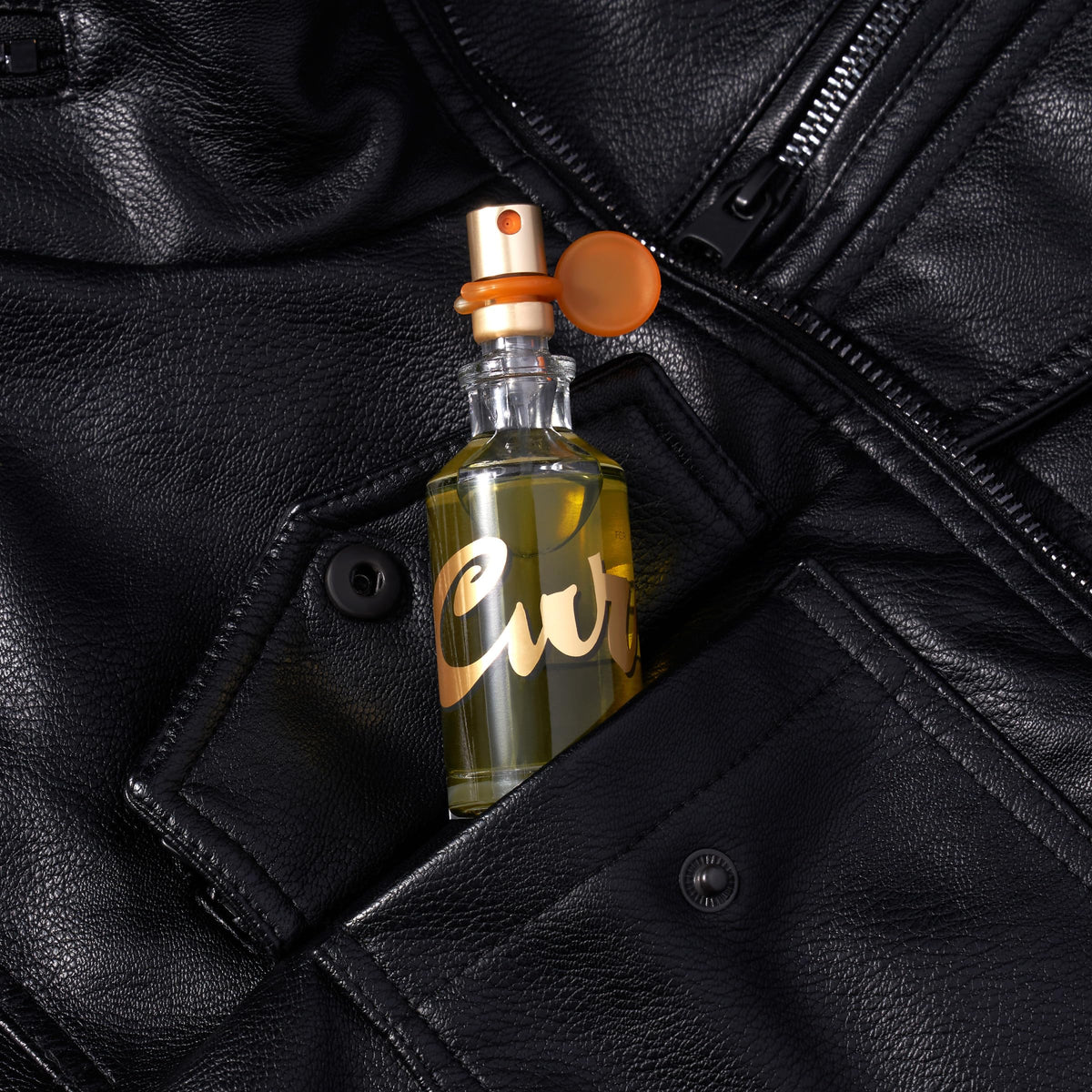 Curve for Men packaging hangtag signals versatile day or night use.