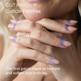 Applying CUTIPATCH patches to clean cuticles for smoother, moisturized skin.