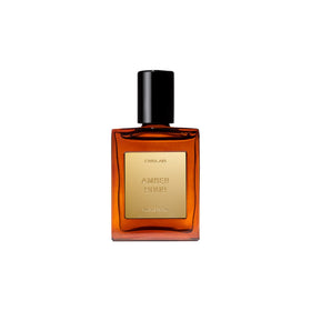 CYKLAR Amber Hour bottle closeup showing rich amber spice fragrance for everyday wear