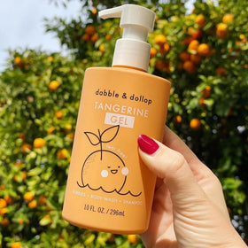 Dabble & Dollop Tangerine 3-in-1 hypoallergenic wash for sensitive skin.