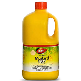 Dabur Kachi Ghani Mustard Oil bottle for versatile skin and hair care